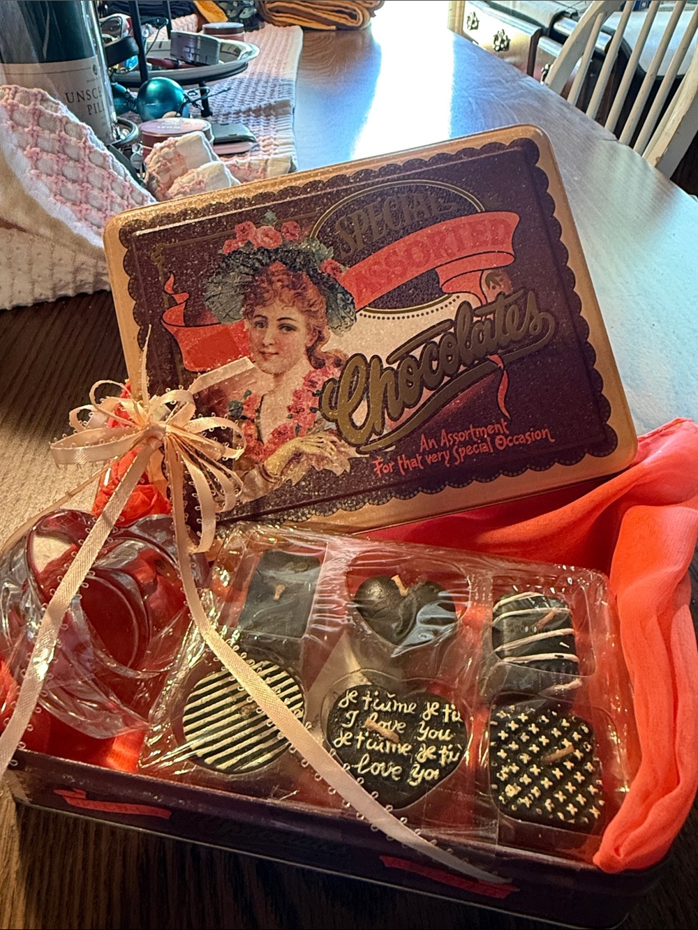 Assorted chocolate tin with candles and holder